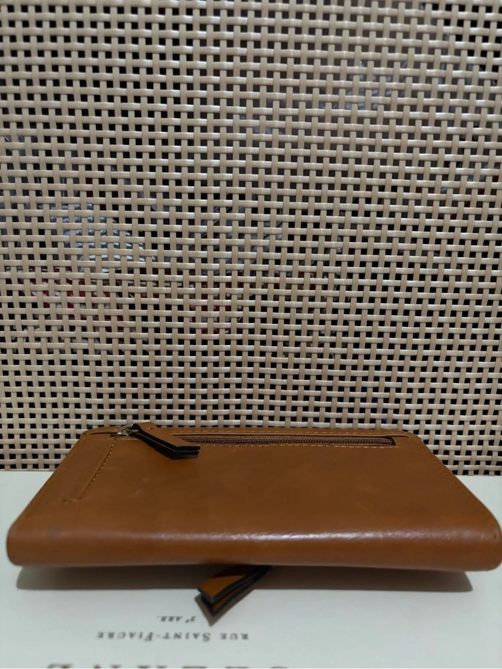 Lodis wallet brown leather featuring knotted tap detail